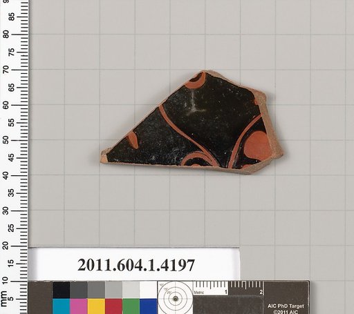 Terracotta fragment of a kylix (drinking cup)