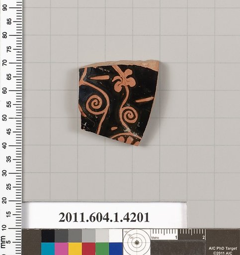 Terracotta fragment of a kylix (drinking cup)