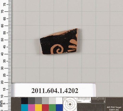 Terracotta fragment of a kylix (drinking cup)