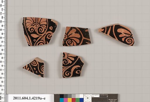 Terracotta fragments of kylikes (drinking cups)