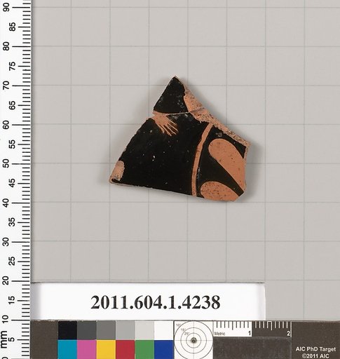 Terracotta fragment of a kylix (drinking cup)