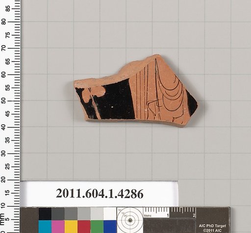 Terracotta fragment of a kylix (drinking cup)