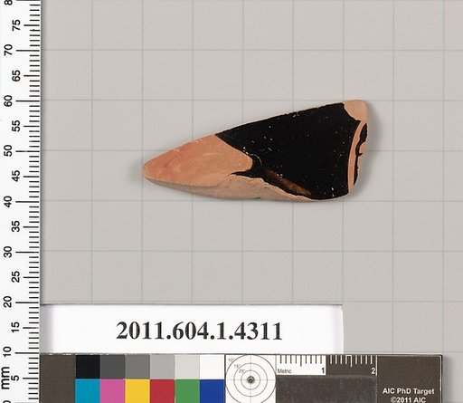 Terracotta fragment of a kylix (drinking cup)