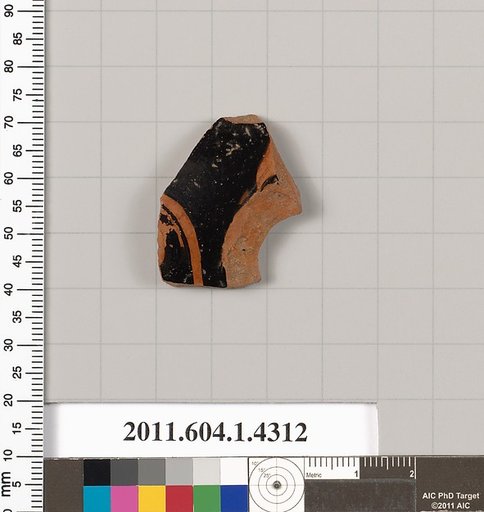 Terracotta fragment of a kylix (drinking cup)