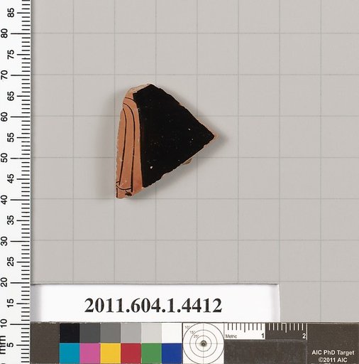 Terracotta fragment of a kylix (drinking cup)