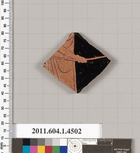 Terracotta fragment of a kylix (drinking cup)