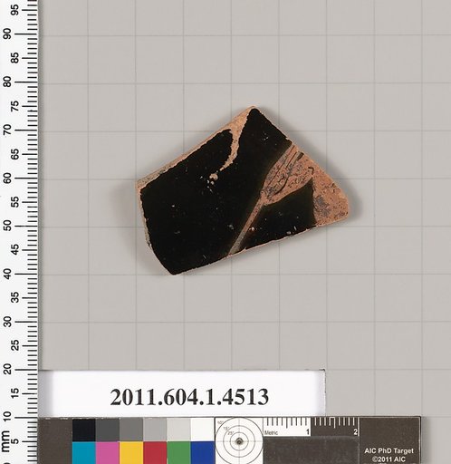 Terracotta fragment of a kylix (drinking cup)
