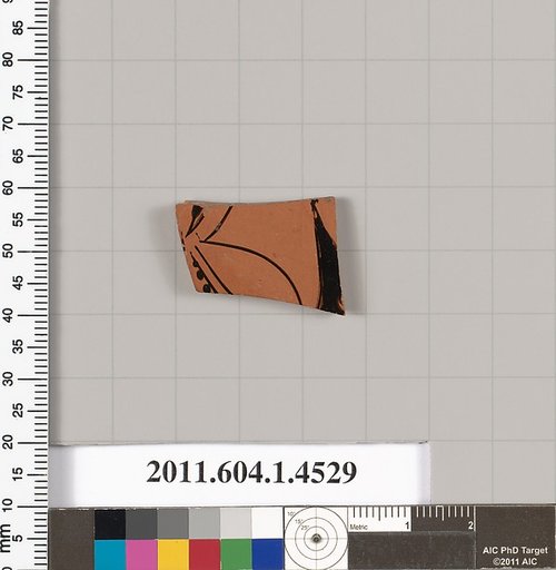 Terracotta fragment of a kylix (drinking cup)