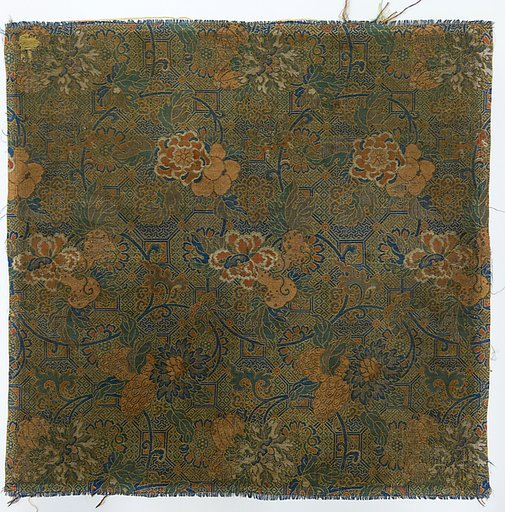 Textile fragment with floral scrolls and geometric pattern