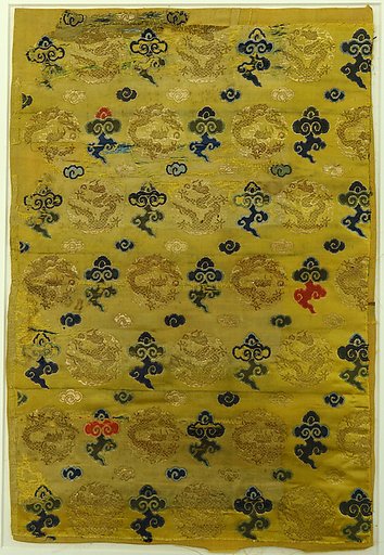 Textile fragment with dragon medallions