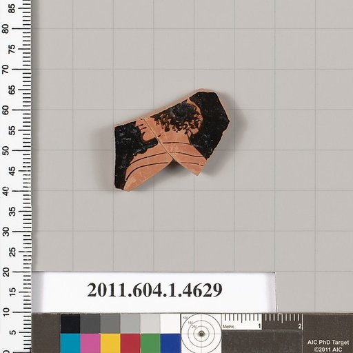 Terracotta fragment of a kylix (drinking cup)