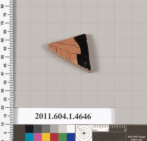 Terracotta fragment of a kylix (drinking cup)