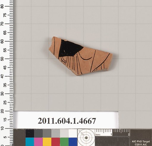Terracotta fragment of a kylix (drinking cup)