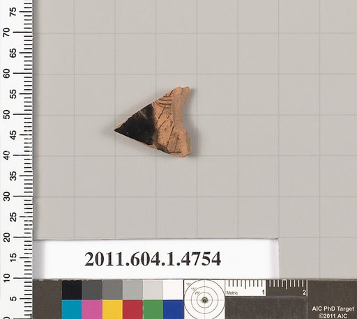 Terracotta fragment of a kylix (drinking cup)