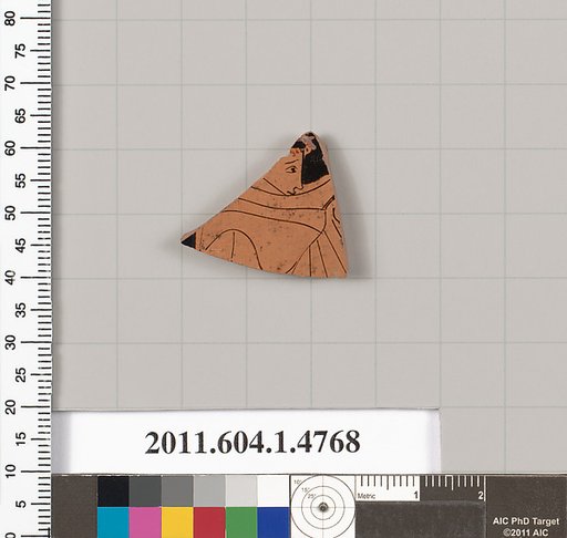 Terracotta fragment of a kylix (drinking cup)
