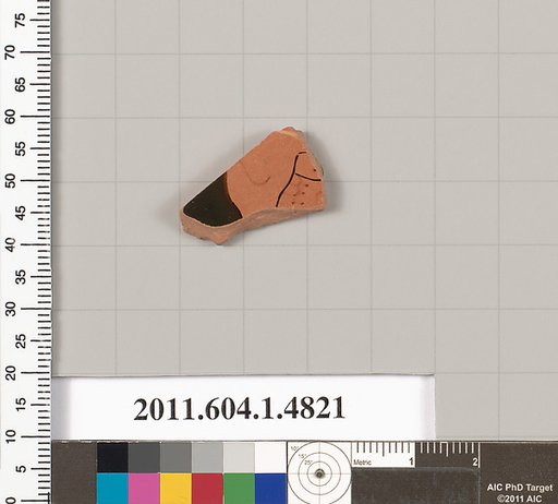 Terracotta fragment of a kylix (drinking cup)