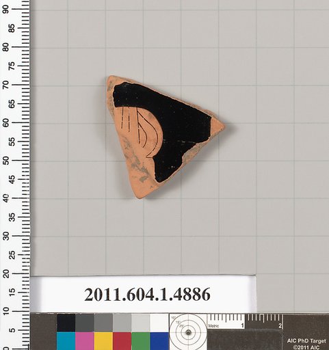 Terracotta fragment of a kylix (drinking cup)