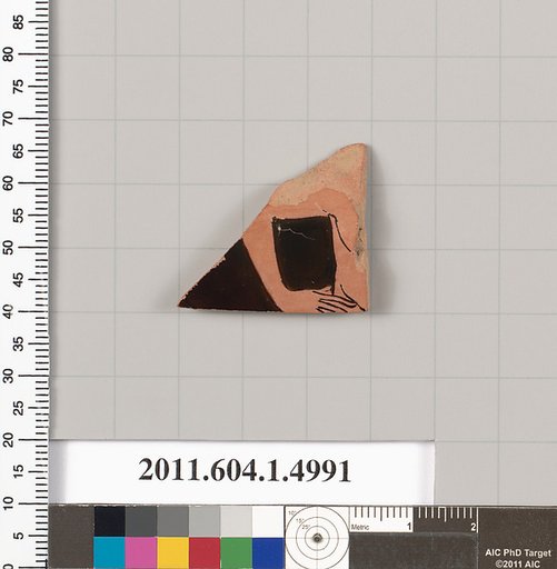 Terracotta fragment of a kylix (drinking cup)