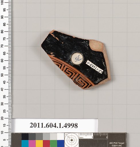 Terracotta fragment of a kylix (drinking cup)