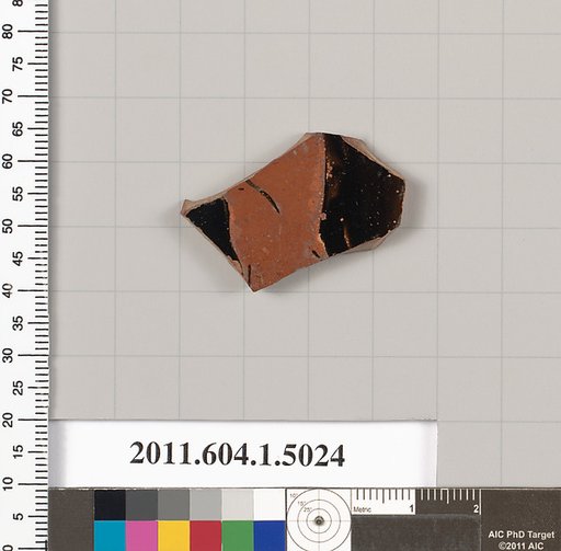 Terracotta fragment of a kylix (drinking cup)