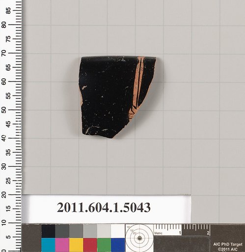 Terracotta fragment of a kylix (drinking cup)