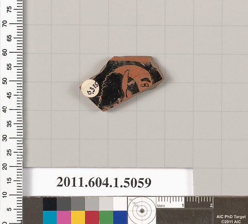 Terracotta fragment of a kylix (drinking cup)