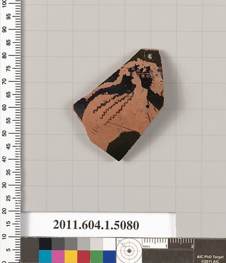 Terracotta rim fragment of a kylix (drinking cup)