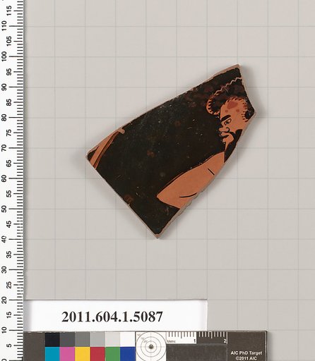 Terracotta fragment of a kylix (drinking cup)
