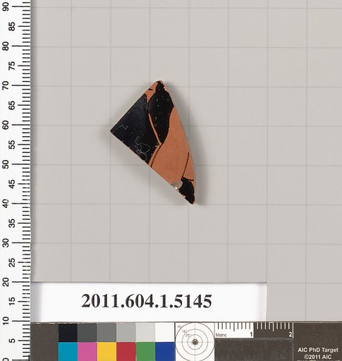 Terracotta fragment of a kylix (drinking cup)