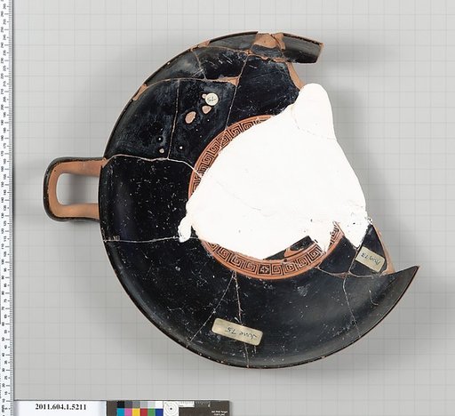 Terracotta fragment of a kylix (drinking cup)
