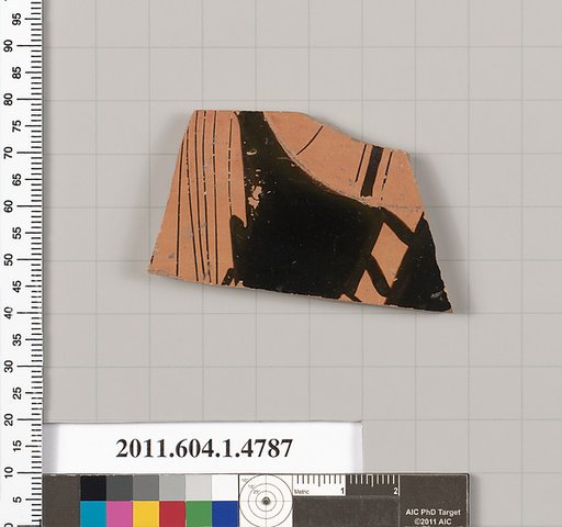 Terracotta fragment of a kylix (drinking cup)