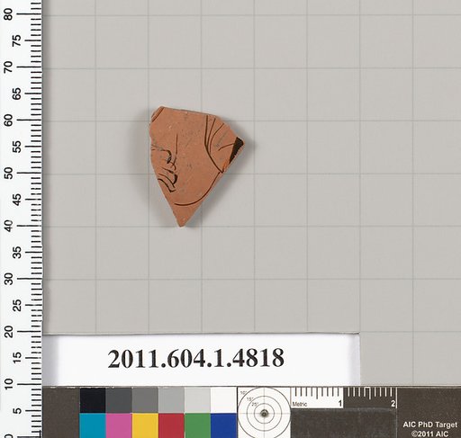 Terracotta fragment of a kylix (drinking cup)