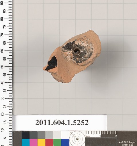 Terracotta fragment of a kylix (drinking cup)