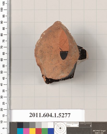 Terracotta fragment of a kylix (drinking cup)