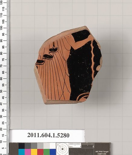 Terracotta fragment of a kylix (drinking cup)