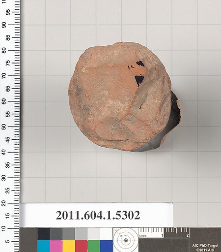 Terracotta fragment of a kylix (drinking cup)