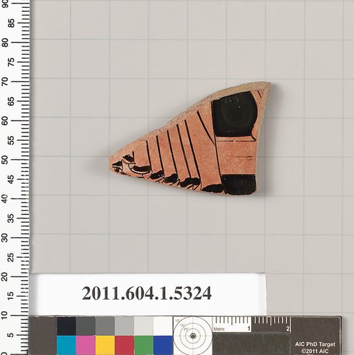 Terracotta fragment of a kylix (drinking cup)