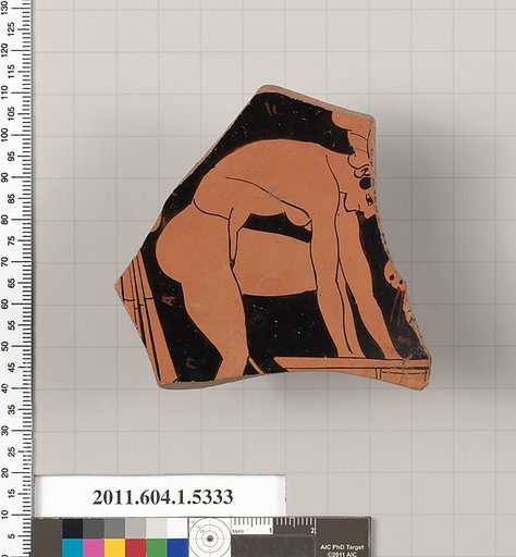 Terracotta fragment of a kylix (drinking cup)
