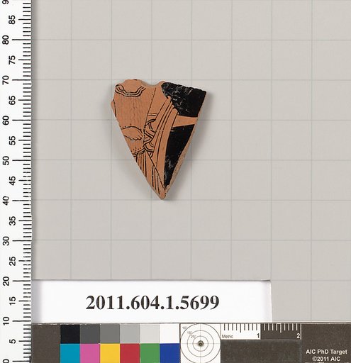 Terracotta fragment of a kylix (drinking cup)