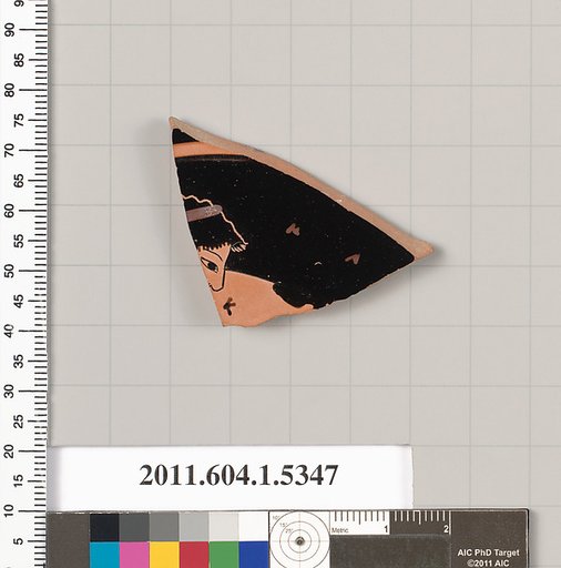 Terracotta fragment of a kylix (drinking cup)