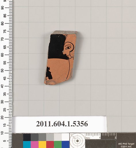 Terracotta fragment of a kylix (drinking cup)