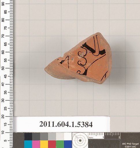 Terracotta fragment of a kylix (drinking cup)