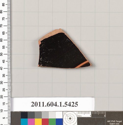 Terracotta fragment of a kylix (drinking cup)