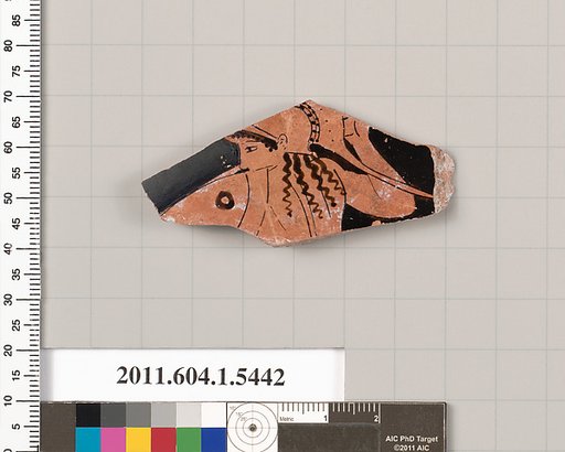 Terracotta fragment of a kylix (drinking cup)