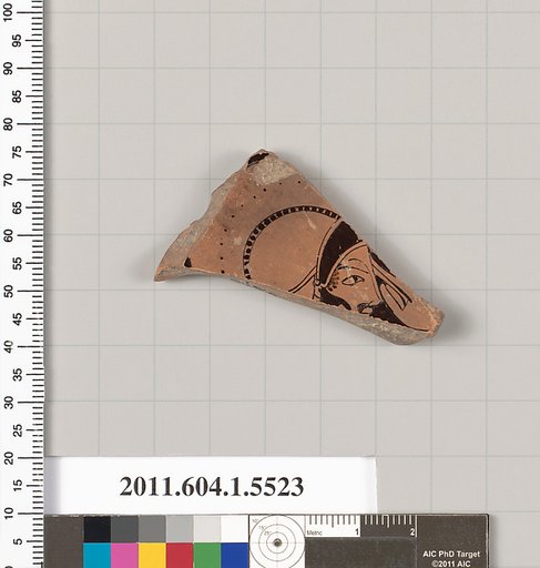 Terracotta fragment of a kylix (drinking cup)