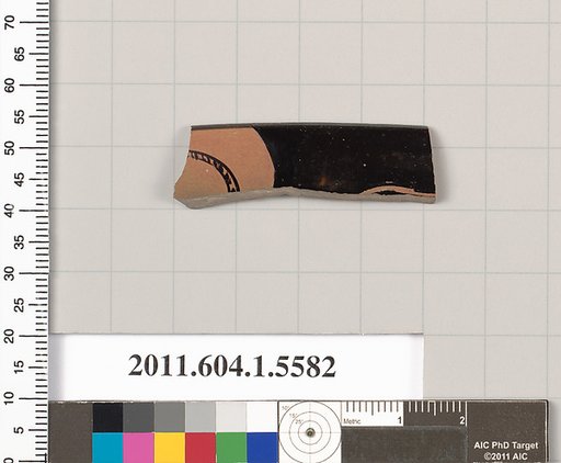 Terracotta rim fragment of a kylix (drinking cup)