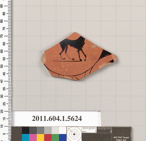Terracotta fragment of a kylix (drinking cup)
