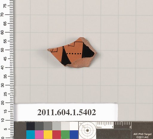 Terracotta fragment of a kylix (drinking cup)