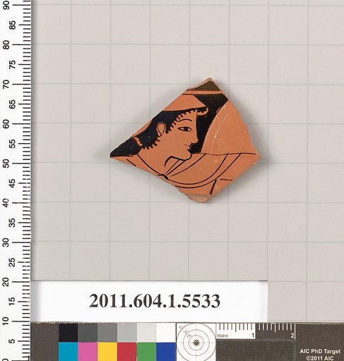 Terracotta fragment of a kylix (drinking cup)