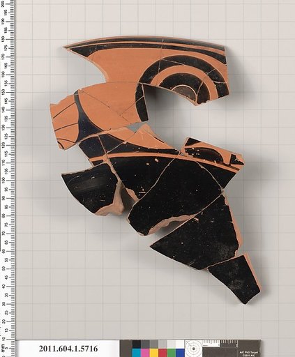 Terracotta fragment of a kylix: eye-cup  (drinking cup)